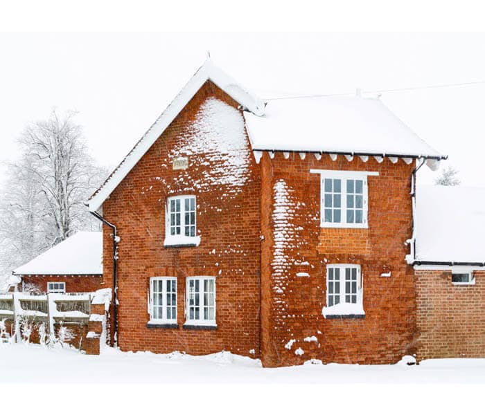 winter house in the snow