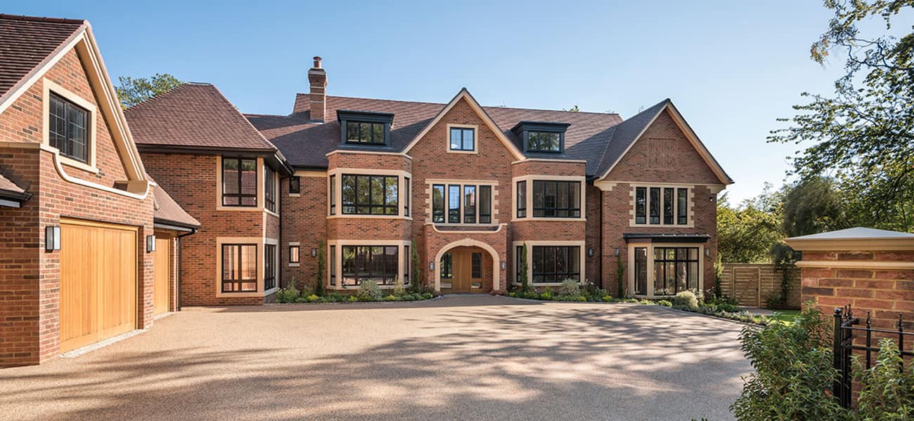 House entrance with acme double camber on the roof