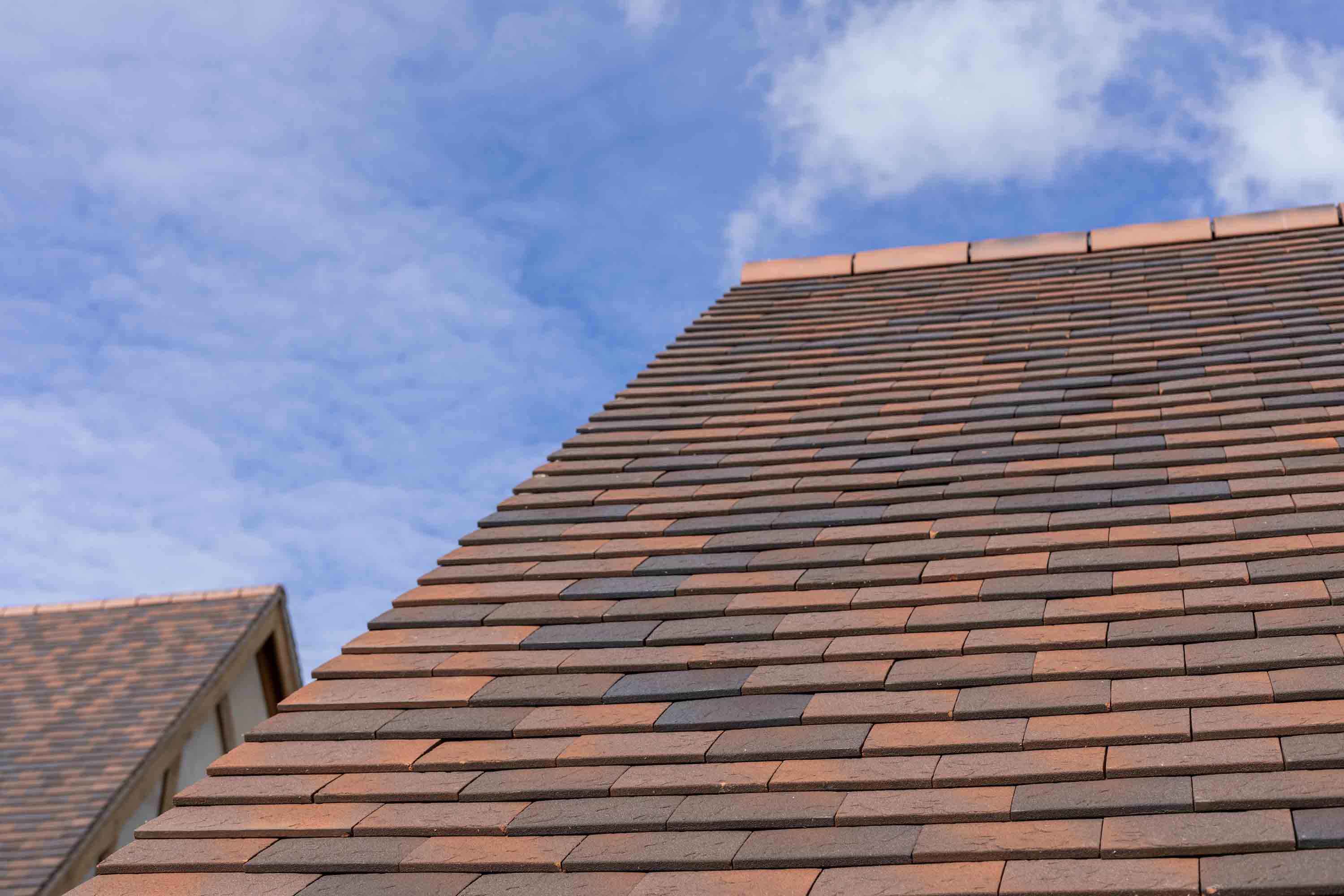 Marley Hawkins clay plain roof tiles installed on domestic home