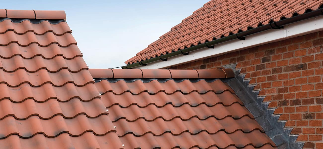 Lincoln case study yard farm in rustic red colour showing close up of ridge details